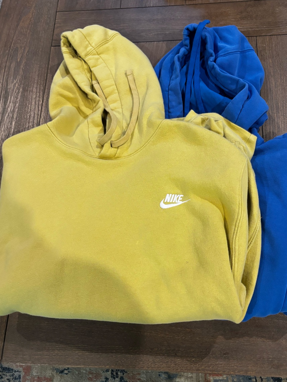 Nike Yellow Hoodie and royal blue hoodie (includes both) yellow -large blue/xlrg